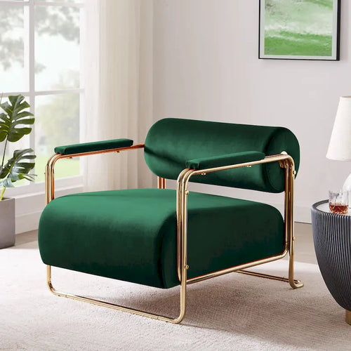 Sillón ancho de terciopelo con respaldo cilíndrico y estructura metálica