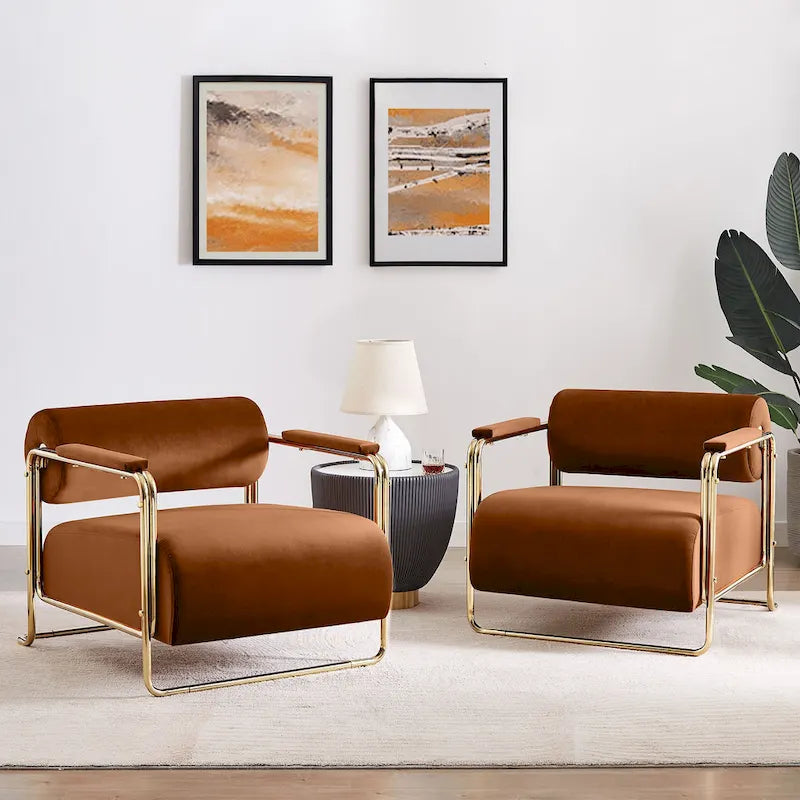 Sillón ancho de terciopelo con respaldo cilíndrico y estructura metálica