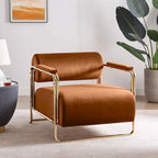 Sillón ancho de terciopelo con respaldo cilíndrico y estructura metálica