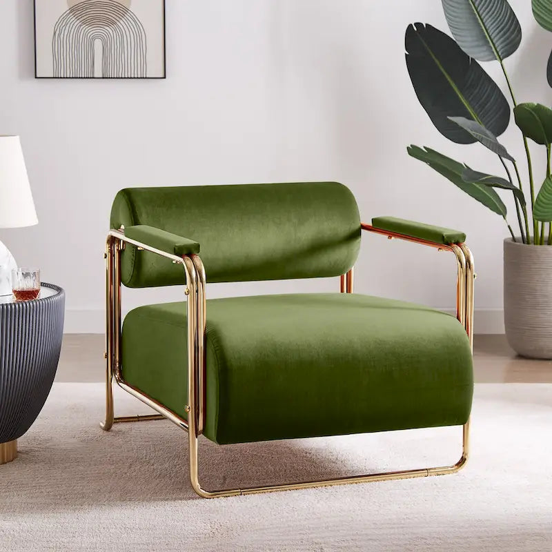Sillón ancho de terciopelo con respaldo cilíndrico y estructura metálica