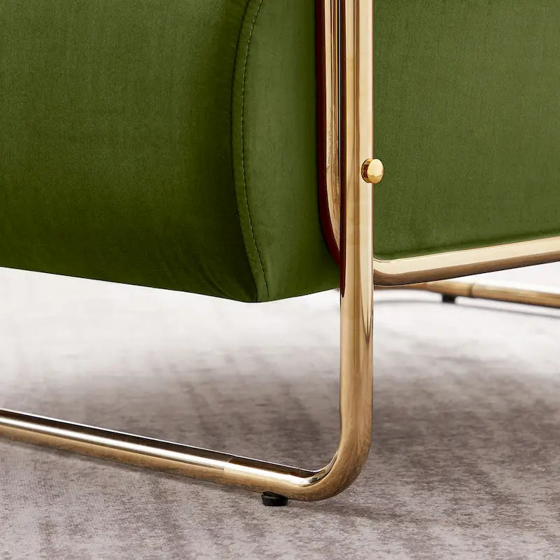 Sillón ancho de terciopelo con respaldo cilíndrico y estructura metálica