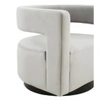 Sillón giratorio tapizado con respaldo calado