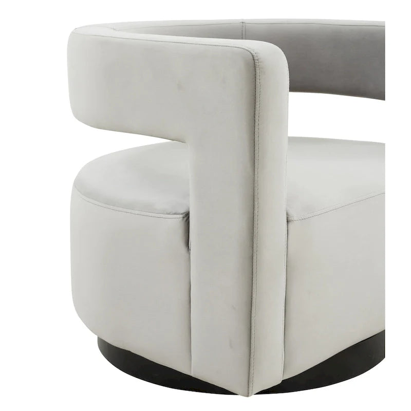 Sillón giratorio tapizado con respaldo calado