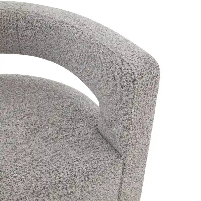 Sillón giratorio tapizado con respaldo calado