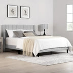 Cama tapizada con plataforma y cabecero capitoné con canales