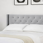 Cama tapizada con plataforma y cabecero capitoné con canales