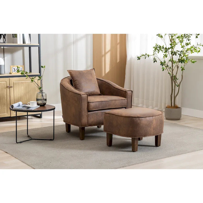 Sillón tapizado tipo barril con otomana