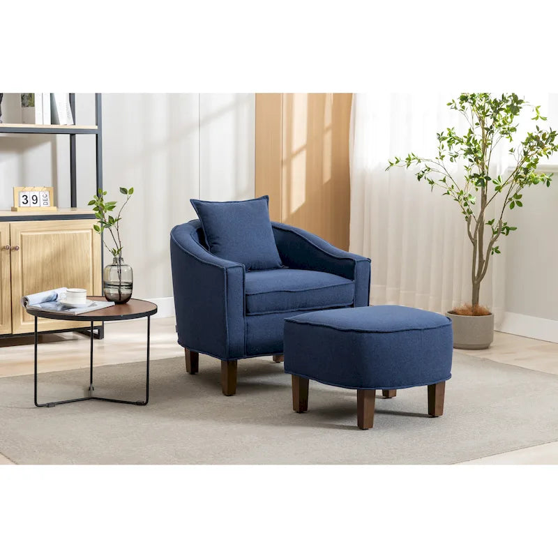 Sillón tapizado tipo barril con otomana