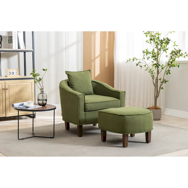 Sillón tapizado tipo barril con otomana