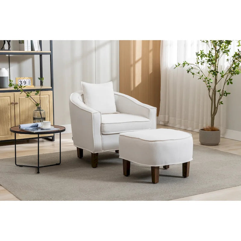 Sillón tapizado tipo barril con otomana