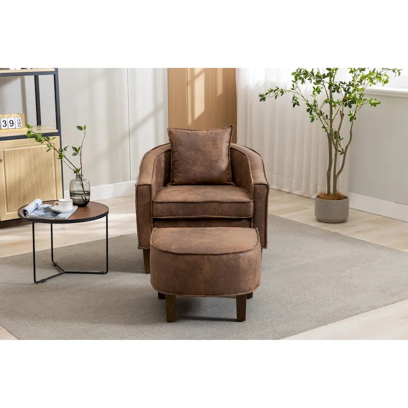 Sillón tapizado tipo barril con otomana