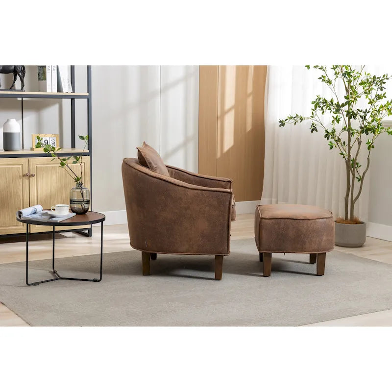 Sillón tapizado tipo barril con otomana