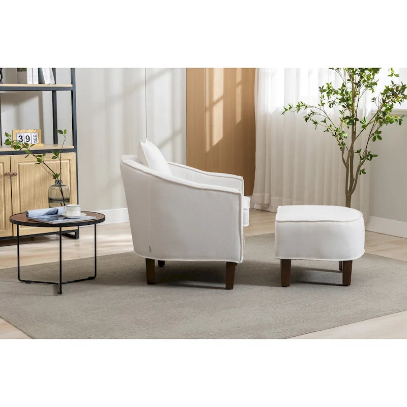 Sillón tapizado tipo barril con otomana