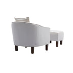 Sillón tapizado tipo barril con otomana