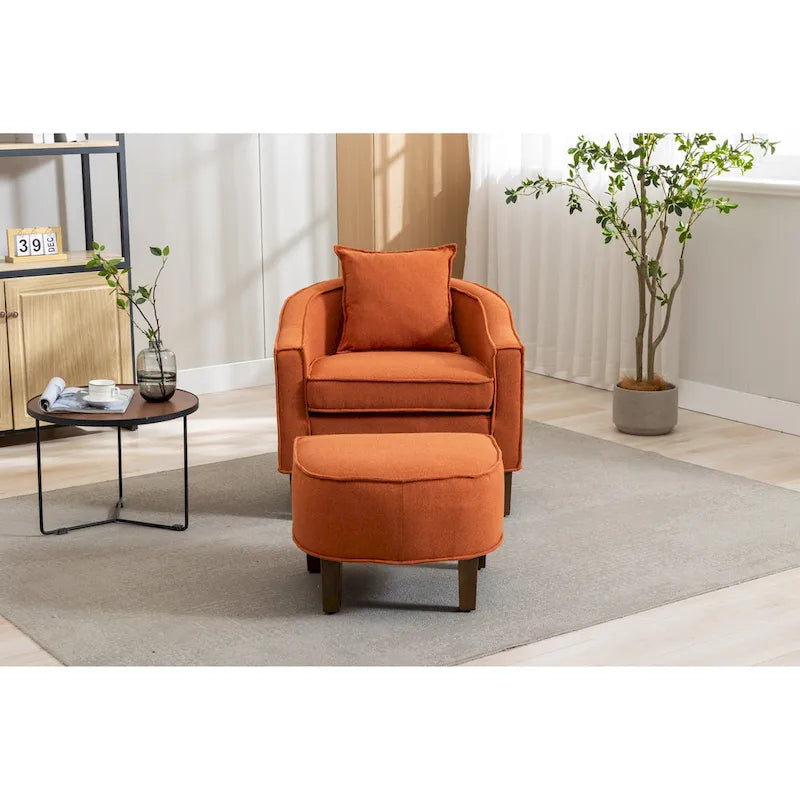 Sillón tapizado tipo barril con otomana