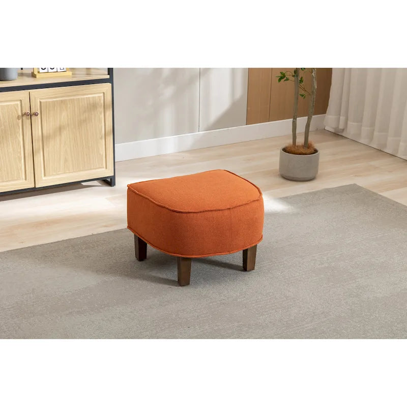 Sillón tapizado tipo barril con otomana