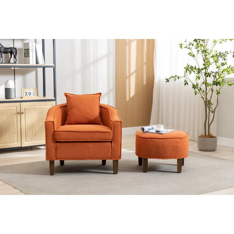 Sillón tapizado tipo barril con otomana