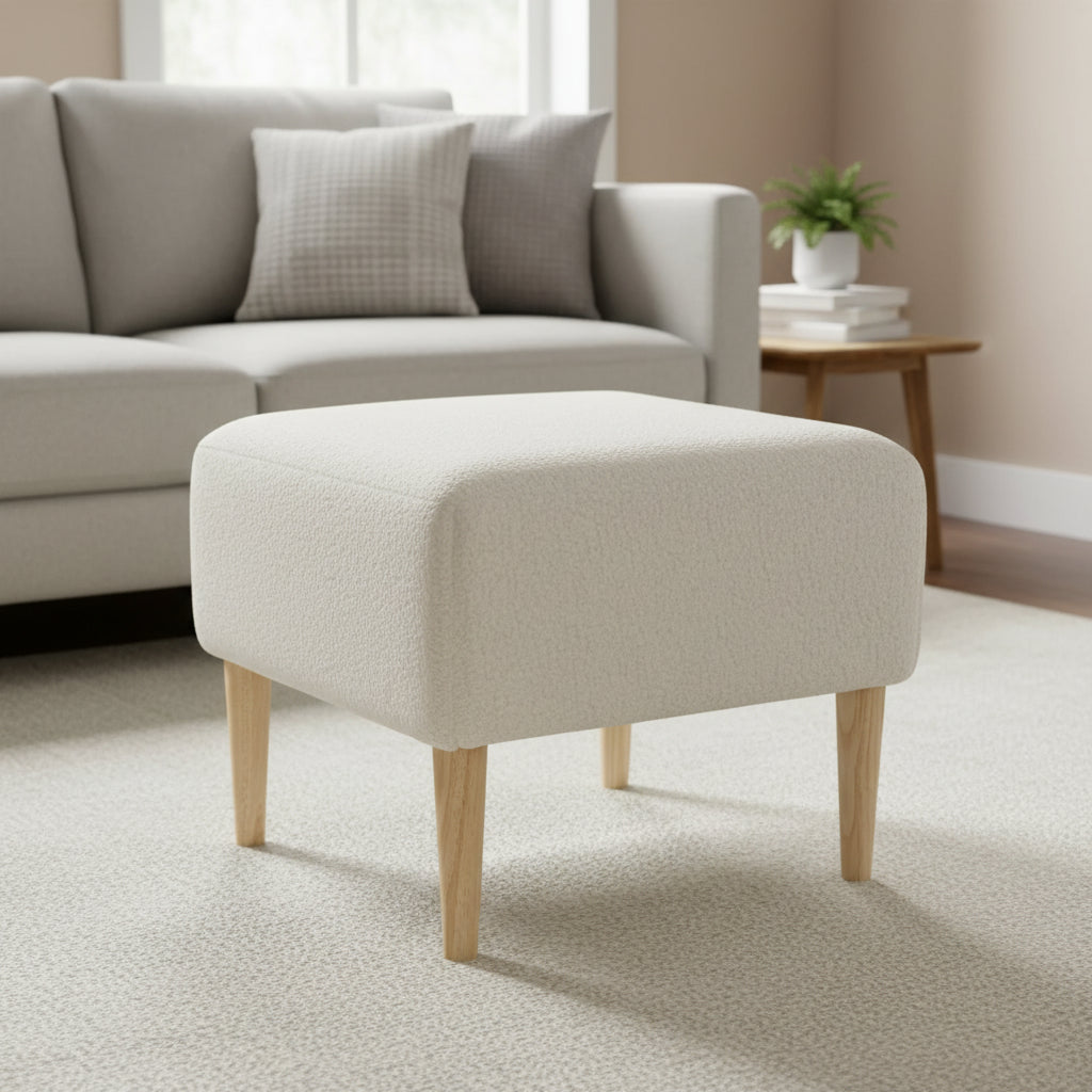 Puf cuadrado de bouclé con patas de madera